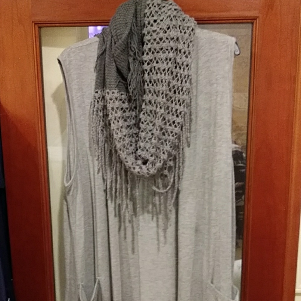 Grey sweater vest with knit scarf